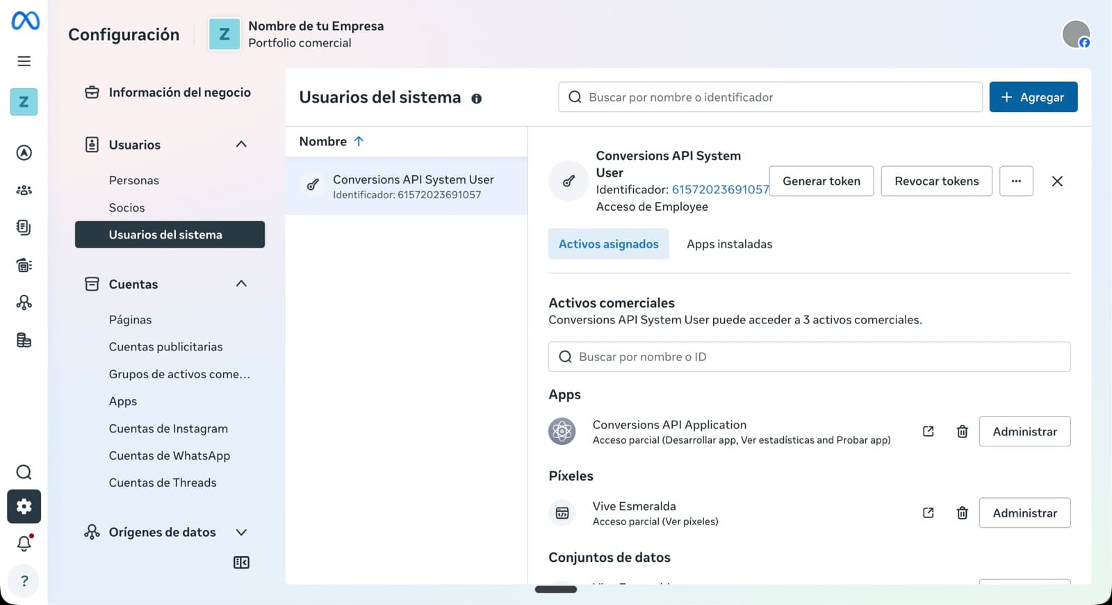 Vista de un System User con sus activos asignados (Apps, Cuentas de WhatsApp), botones 'Generar token' y 'Revocar tokens'.